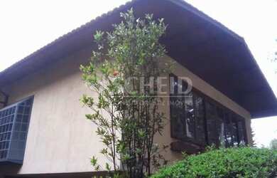 Imagem: A casa para alugar possui 4 Dormitórios, 5 Banheiros, 4 Vagas