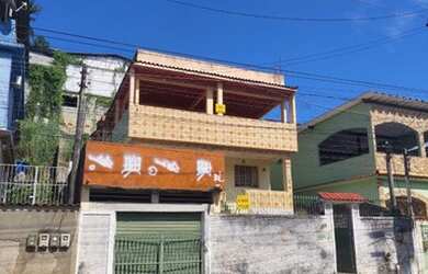 Imagem: A casa possui 3 Dormitórios, 3 Banheiros, 1 Vaga na garagem