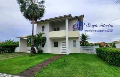 Imagem: A casa possui 5 Dormitórios, 5 Banheiros, 4 Vagas na garagem