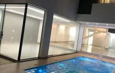 Imagem: A casa possui 4 Dormitórios, 4 Banheiros, 2 Vagas na garagem