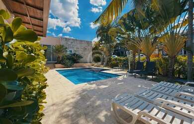 Imagem: A casa em condomínio possui 4 Dormitórios, 5 Banheiros, 2