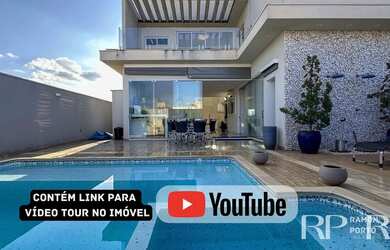 Imagem: A casa possui 3 Dormitórios, 5 Banheiros, 4 Vagas na garagem