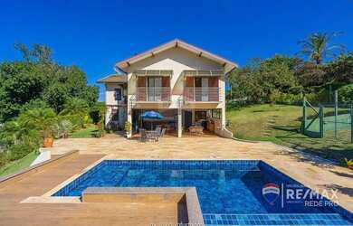 Imagem: A casa em condomínio possui 4 Dormitórios, 4 Banheiros, 288m²