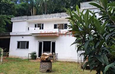 Imagem: A casa possui 2 Dormitórios, 3 Banheiros, 3 Vagas na garagem