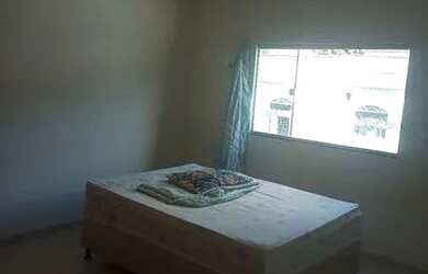 Imagem: A casa possui 3 Dormitórios, 2 Banheiros, 1 Vaga na garagem