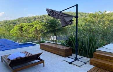 Imagem: A casa em condomínio possui 5 Dormitórios, 5 Banheiros, 5