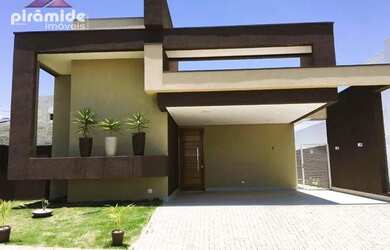 Imagem: A casa possui 3 Dormitórios, 4 Banheiros, 4 Vagas na garagem