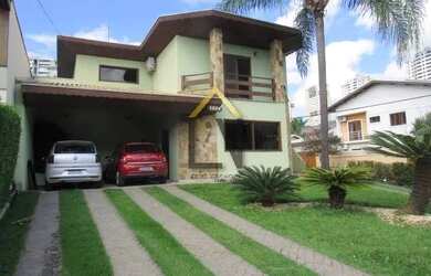 Imagem: A casa em condomínio possui 3 Dormitórios, 4 Banheiros, 5