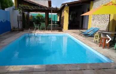 Imagem: A casa possui 5 Dormitórios, 5 Banheiros, 5 Vagas na garagem