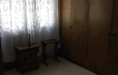 Imagem 3: Andar alto com vista parcial do mar