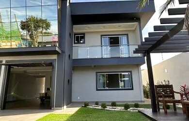 Imagem: A casa possui 5 Dormitórios, 5 Banheiros, 5 Vagas na garagem