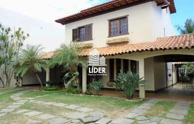 Imagem: A casa possui 4 Dormitórios, 5 Banheiros, 5 Vagas na garagem