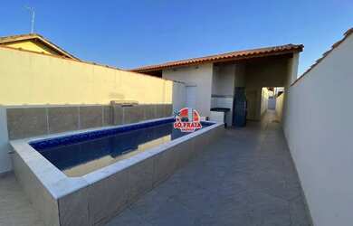 Imagem: A casa possui 2 Dormitórios, 2 Banheiros, 3 Vagas na garagem