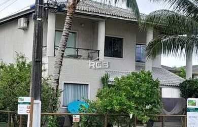 Imagem: A casa em condomínio possui 4 Dormitórios, 4 Banheiros, 2