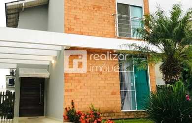 Imagem: A casa possui 4 Dormitórios, 5 Banheiros, 2 Vagas na garagem