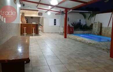 Imagem: A casa possui 2 Dormitórios, 3 Banheiros, 3 Vagas na garagem