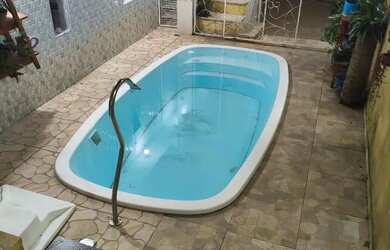 Imagem: A casa possui 5 Dormitórios, 4 Banheiros, 1 Vaga na garagem