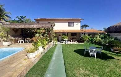 Imagem: A casa possui 4 Dormitórios, 5 Banheiros, 5 Vagas na garagem