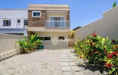 Imagem: A casa possui 3 Dormitórios, 4 Banheiros, 2 Vagas na garagem