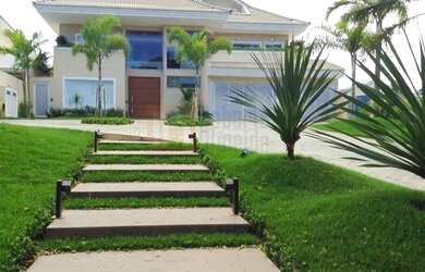 Imagem: A casa em condomínio possui 5 Dormitórios, 5 Banheiros, 4