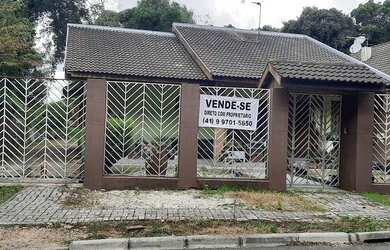 Imagem: A casa possui 3 Dormitórios, 1 Banheiro, 3 Vagas na garagem