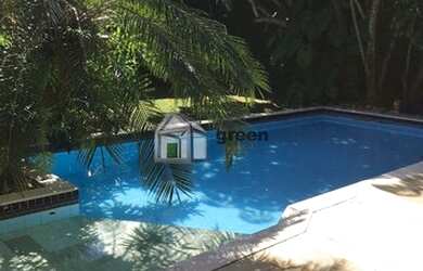 Imagem: A casa em condomínio possui 5 Dormitórios, 5 Banheiros, 5