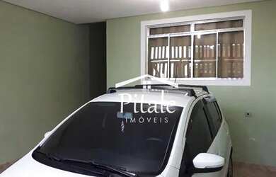 Imagem: A casa possui 3 Dormitórios, 3 Banheiros, 2 Vagas na garagem