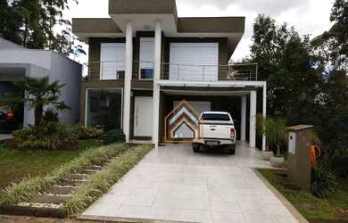 Imagem: A casa em condomínio possui 3 Dormitórios, 3 Banheiros, 2