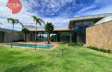 Imagem: A casa em condomínio possui 4 Dormitórios, 5 Banheiros, 3