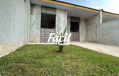 Imagem: A casa possui 2 Dormitórios, 1 Banheiro, 2 Vagas na garagem