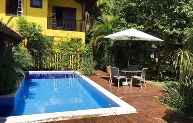 Imagem: A casa em condomínio possui 4 Dormitórios, 2 Banheiros, 4