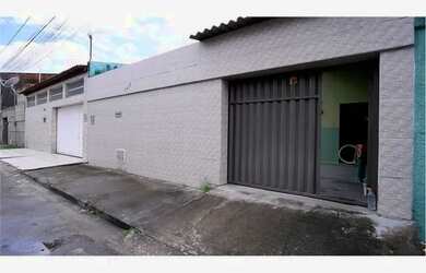 Imagem: A casa possui 3 Dormitórios, 2 Banheiros, 3 Vagas na garagem