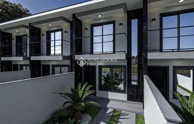 Imagem: A casa possui 2 Dormitórios, 1 Banheiro, 1 Vaga na garagem