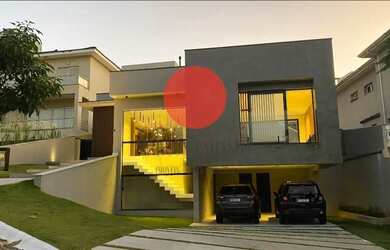 Imagem: A casa em condomínio possui 4 Dormitórios, 5 Banheiros, 5