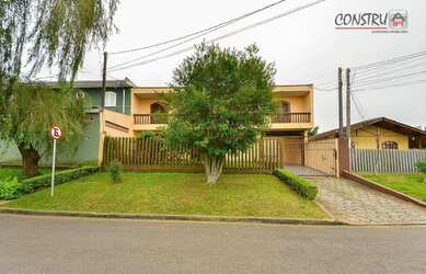 Imagem: A casa em condomínio possui 4 Dormitórios, 3 Banheiros, 5
