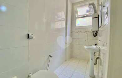 Imagem 14: Sala e quarto em prédio familiar bem administrado em frente ao Aterro...