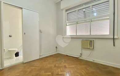 Imagem 11: Sala e quarto em prédio familiar bem administrado em frente ao Aterro...