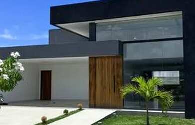 Imagem: A casa possui 3 Dormitórios, 3 Banheiros, 4 Vagas na garagem