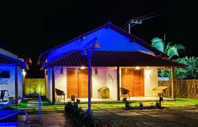 Imagem: A casa possui 5 Dormitórios, 5 Banheiros, 5 Vagas na garagem