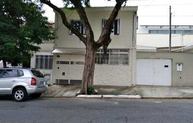 Imagem: A casa possui 3 Dormitórios, 2 Banheiros, 1 Vaga na garagem