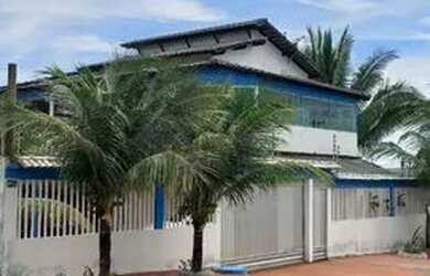 Imagem: A casa possui 5 Dormitórios, 5 Banheiros, 5 Vagas na garagem