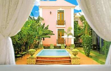 Imagem: A casa possui 3 Dormitórios, 2 Banheiros, 3 Vagas na garagem