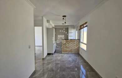 Imagem: O apartamento possui 2 Dormitórios, 1 Banheiro, 1 Vaga na garagem