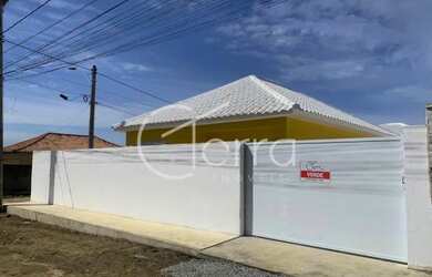 Imagem: A casa possui 2 Dormitórios, 2 Banheiros, 3 Vagas na garagem