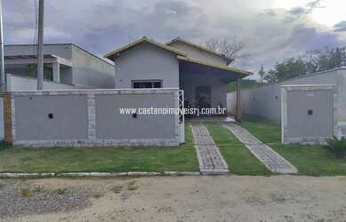 Imagem: A casa possui 2 Dormitórios, 3 Banheiros, 2 Vagas na garagem