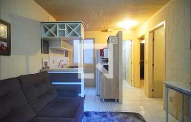 Imagem: O apartamento possui 2 Dormitórios, 1 Banheiro, 1 Vaga na garagem