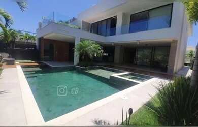 Imagem: A casa em condomínio possui 5 Dormitórios, 5 Banheiros, 3