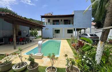 Imagem: A casa possui 5 Dormitórios, 5 Banheiros, 5 Vagas na garagem