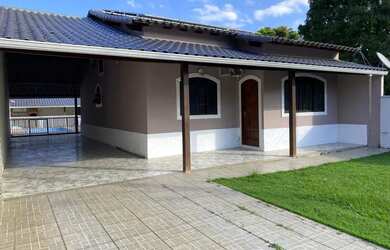 Imagem: A casa possui 2 Dormitórios, 1 Banheiro, 3 Vagas na garagem