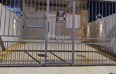 Imagem: A casa possui 2 Dormitórios, 2 Banheiros, 1 Vaga na garagem